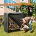 A man is loading wood into a firewood rack.