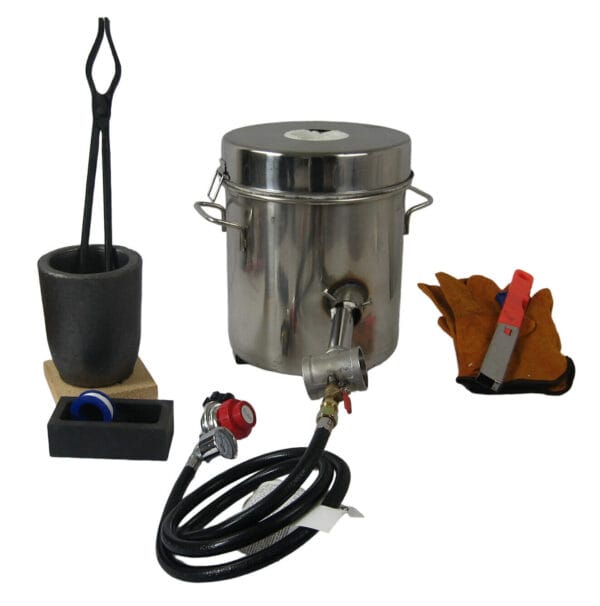 A metal pot with a hose and other items.