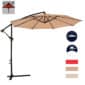 A tan umbrella on a stand.