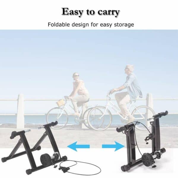 A bicycle trainer with a couple of people riding bikes.