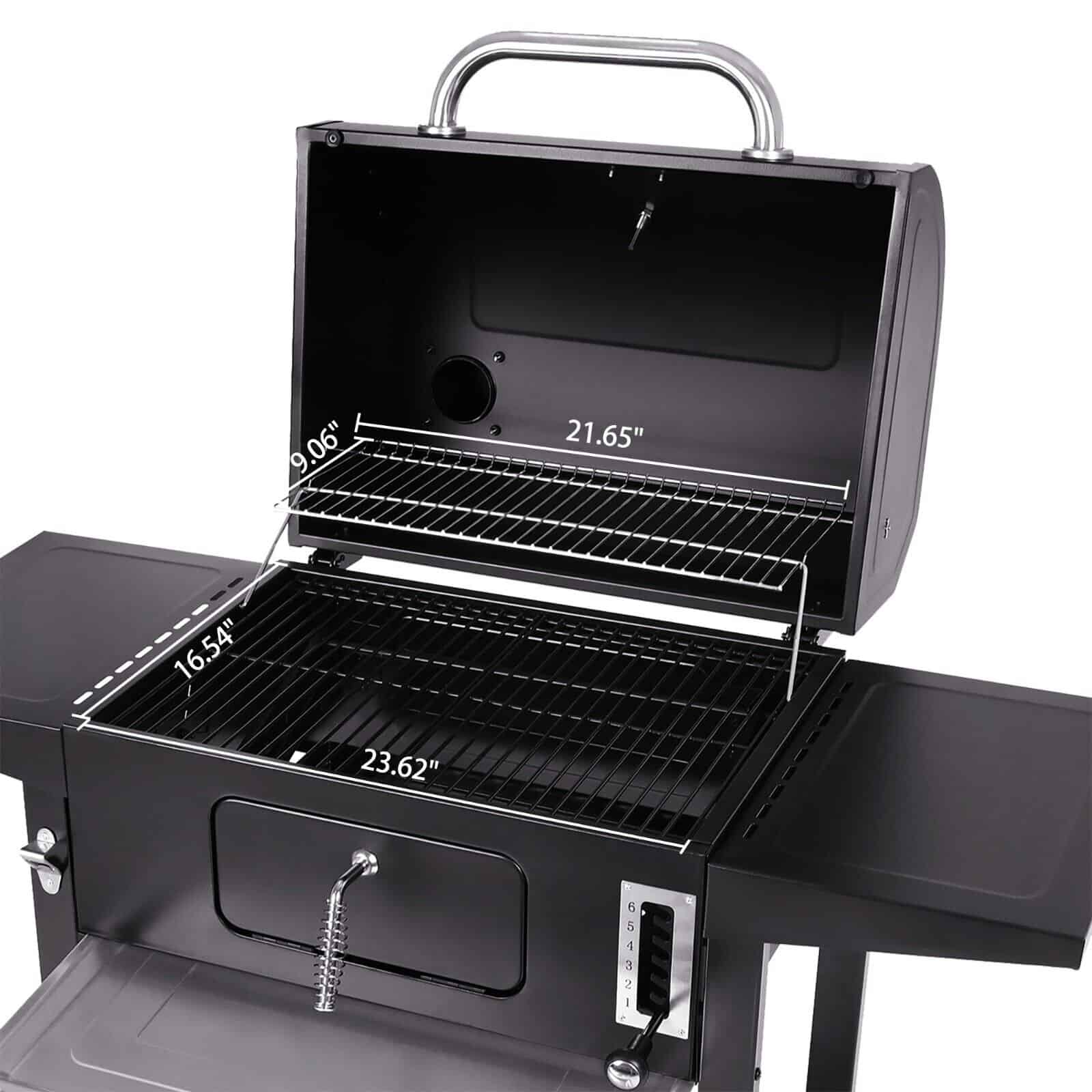 A black barbecue with a lid open.