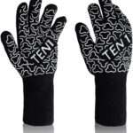 A pair of black and white gloves with the word tent on them.