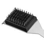 A stainless steel brush on a white background.