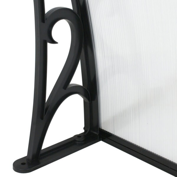 A black and white wrought iron fireplace screen.