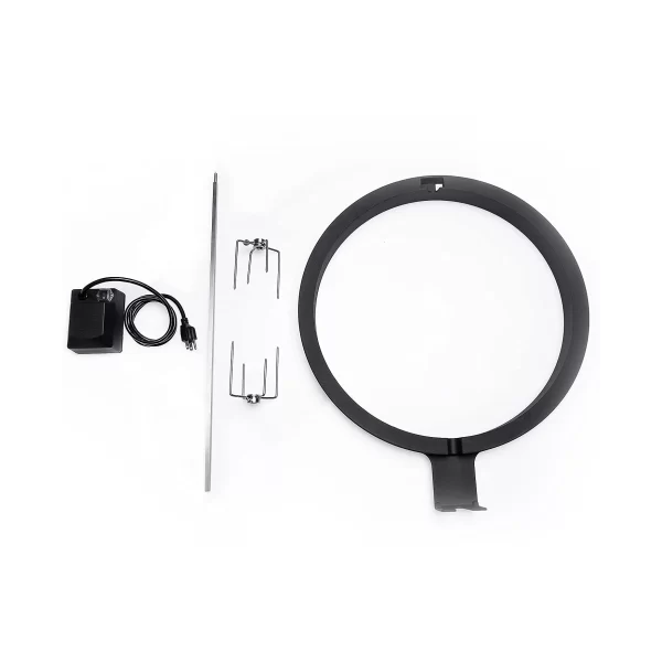 Overhead view of a black Kamado Joe KJ TISSERIENA ring light with adjustable stand, power adapter, and mounting clip accessories on a white background.