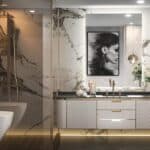 Luxurious bathroom with marble walls, dual vanity, 36 x 24 LED Bathroom Mirror, freestanding tub, and a shower, accented by a large portrait and elegant lighting.