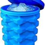 The Ultimate Mini Ice Cube Maker Silicone Bucket Ice Mold and Storage Bin Blue with its lid open, showing ice cubes inside.