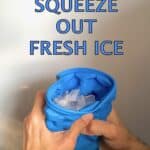 The Mini Ice Cube Maker Silicone Bucket Ice Mold and Storage Bin Blue: Hands squeezing a blue, flexible ice cube tray with the phrase "squeeze out fresh ice" at the top, releasing mini ice cubes.