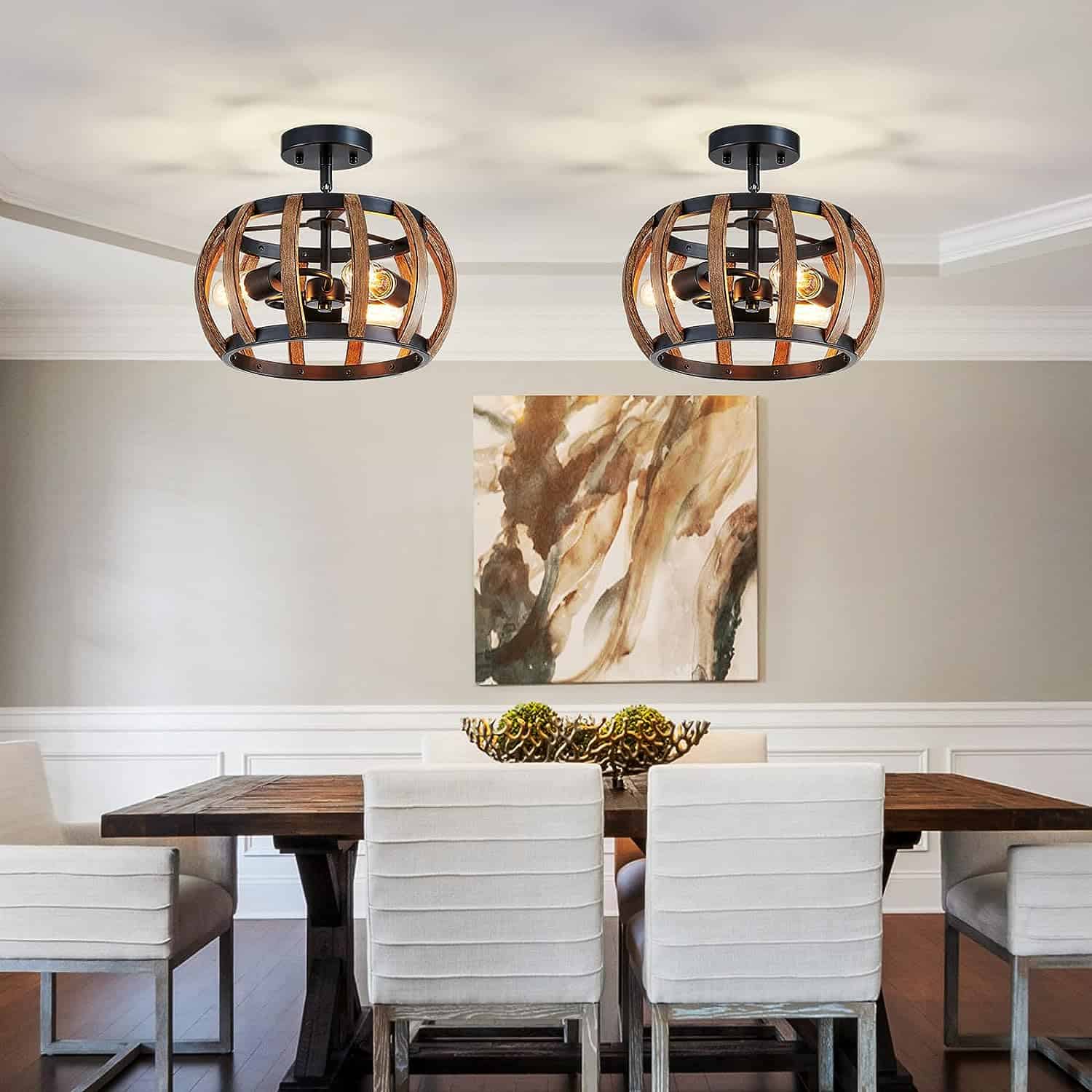 Modern dining room with two wooden tables, white chairs, abstract wall art, and Farmhouse Chandelier Globe Pendant Light Fixtures Rustic Chandeliers.
