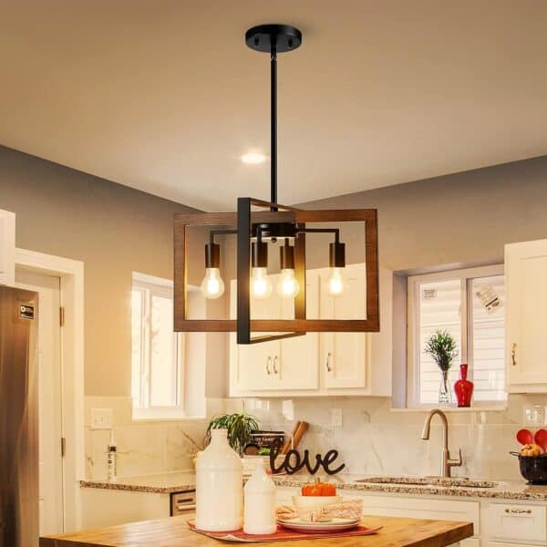 A modern kitchen interior with a Modern 1-Light Semi-Flush Mount Ceiling Light Vintage Close to Ceiling Light Fixtures with Clear Glass Shade, marble countertops, and tastefully arranged decorative items.