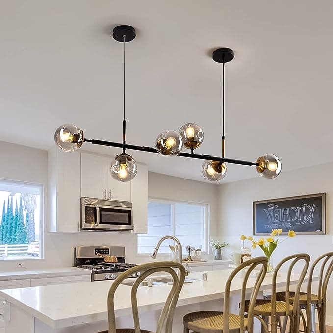 Chandelier lights over a kitchen counter