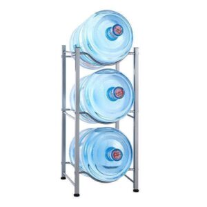 A 3-Tier Water Rack Stainless Steel Heavy Duty Water Cooler Jug Rack holding three large blue water bottles, each bottle positioned horizontally on its own shelf.