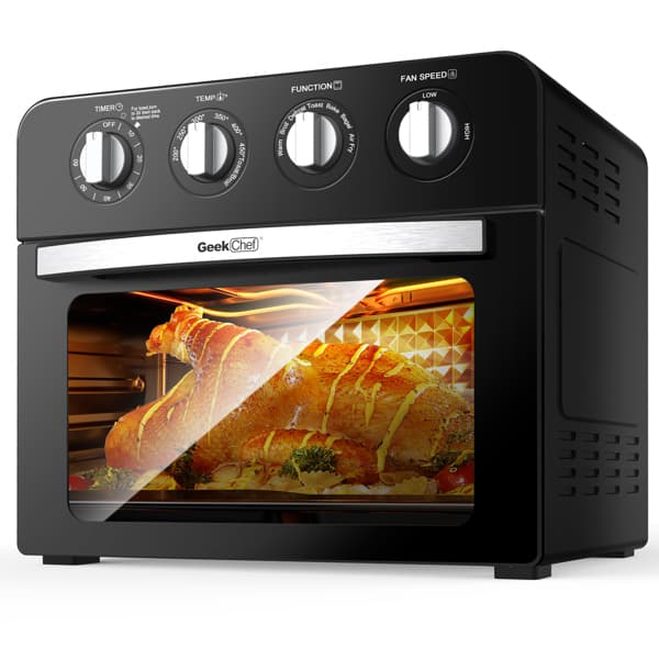A black Geek Chef Air Fryer Toaster Oven 24QT convection air fryer oven with a transparent door showing a chicken roasting inside, surrounded by control knobs and vents.