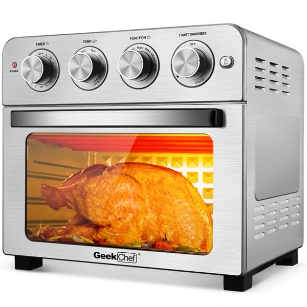 A Geek Chef Toaster Oven 6 Slice 24QT Convection Air fryer 1700W with a whole roasted chicken inside, visible through the glass door.