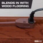 A Iron Forge Cable Brown Extension Cord with 3 Outlets 3 Pack, 10ft 15ft & 20ft, 16/2 Indoor Extension Cord with Multiple Outlets, 13 AMP 2 Prong Electrical Cable for Home, Office, Household Appliances and cable on a wood floor with text stating "blends in with wood flooring" and the iron forge cable logo.